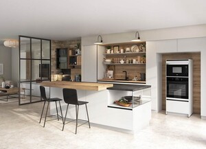 Kitchen with custom-made aluminum interior and German wood exterior.